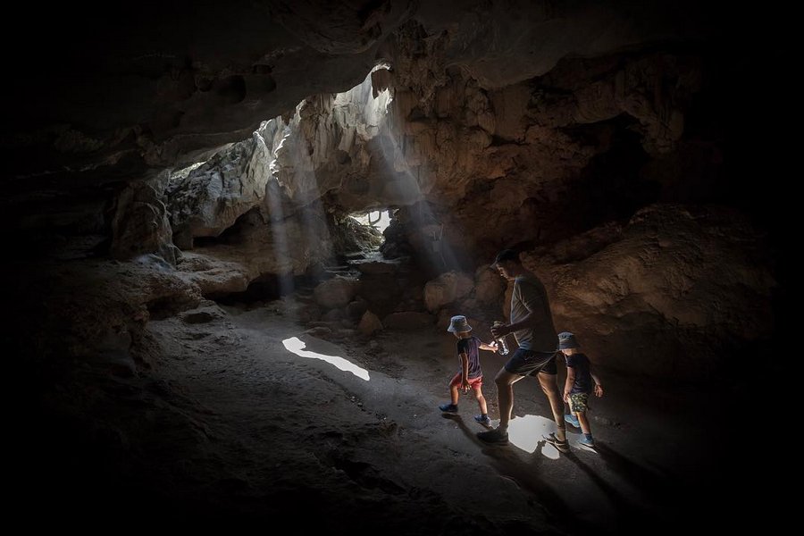 Visitors explore Thien Canh Son cave